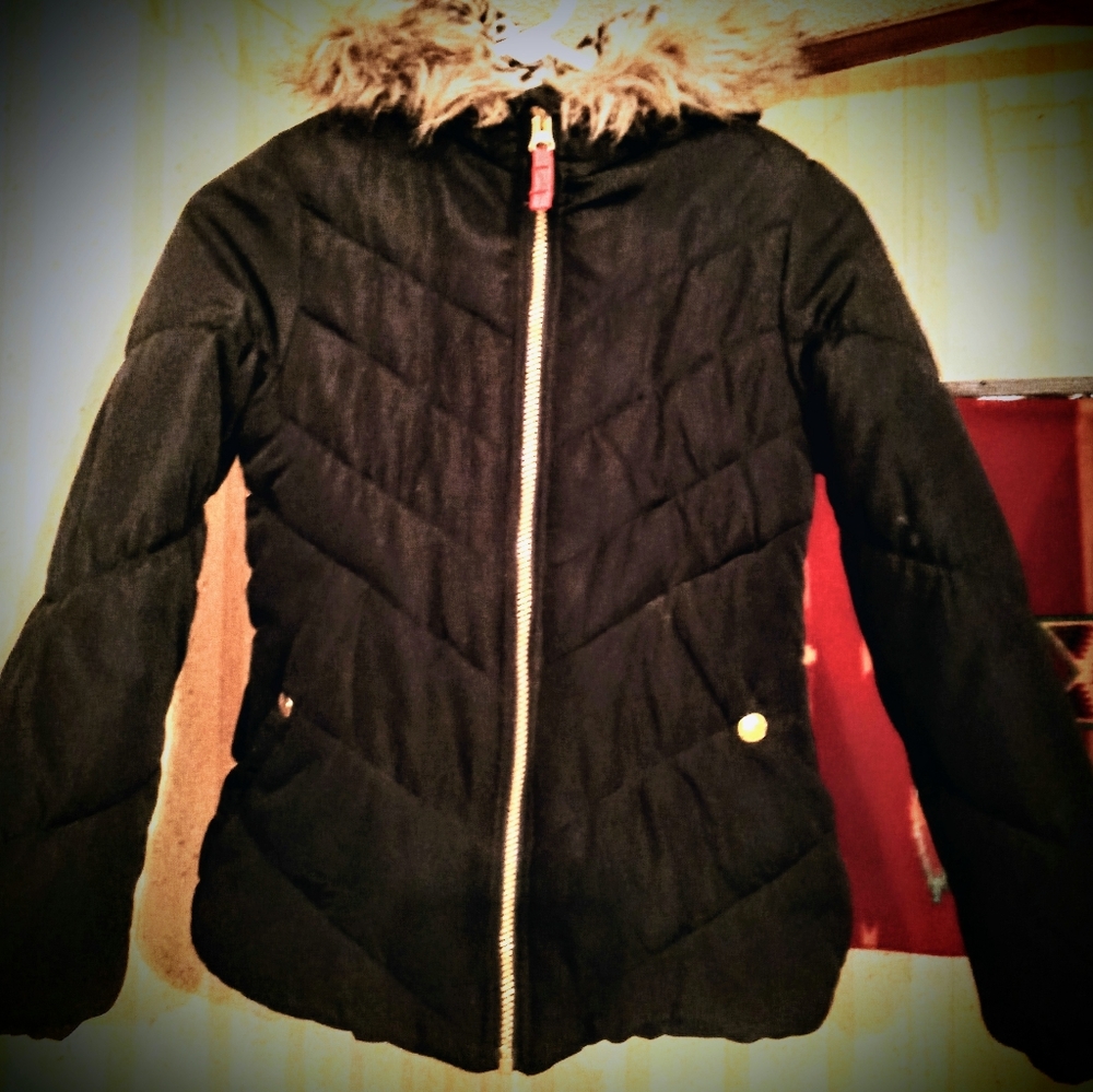 Black puffer coat with faux fur around the hoodie